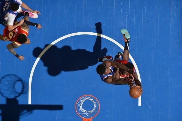 Joel Embiid of the Philadelphia 76ers attempts to block the shot of Clint Capela of the Atlanta Hawks during Round 2, Game 5 of the Eastern...