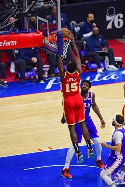 Clint Capela of the Atlanta Hawks dunks against the Philadelphia 76ers in game 5 of the conference semifinals on June 16, 2021 at Wells Fargo Center,...
