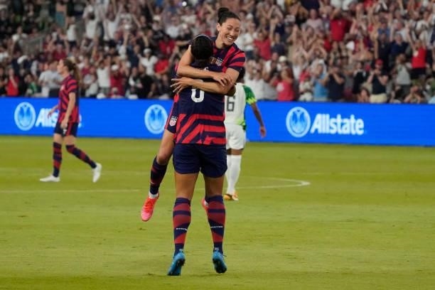 Lynn Williams of the United States celebrates with teammate Christen Press after scoring a goal against Nigeria during the second half of their WNT...