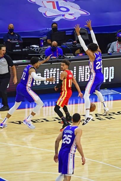 Trae Young of the Atlanta Hawks passes the ball against the Philadelphia 76ers in game 5 of the conference semifinals on June 16, 2021 at Wells Fargo...