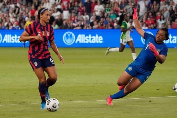 Lynn Williams of the United States scores a goal against goalkeeper Tochukwu Oluehi of Nigeria during the second half of their WNT Summer Series game...