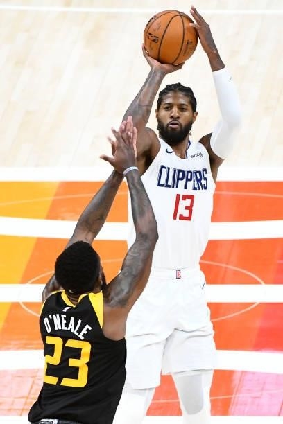 Paul George of the Los Angeles Clippers shoots against Royce O'Neale of the Utah Jazz in Game Five of the Western Conference second-round playoff...