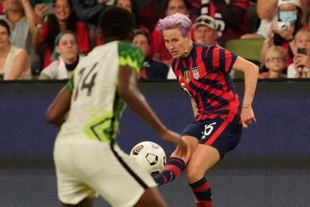 Megan Rapinoe of the United States passes the ball against Chidinma Okeke of Nigeria during the second half of their WNT Summer Series game at Q2...