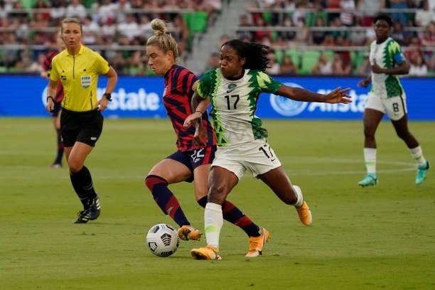 Kristie Mewis of the United States controls the ball against Francisca Ordega of Nigeria during the first half of their WNT Summer Series game at Q2...