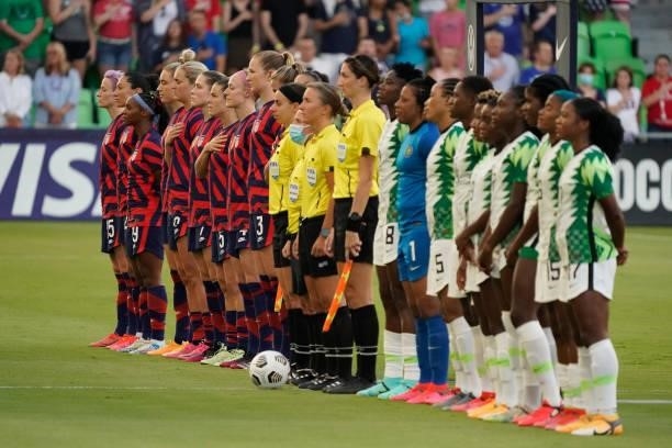 Players of the United States and Nigeria stand for their national anthems before their WNT Summer Series game at Q2 Stadium on June 16, 2021 in...