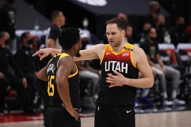Bojan Bogdanovic of the Utah Jazz talks to teammate Donovan Mitchell during the game against the LA Clippers during Round 2, Game 5 of the 2021 NBA...