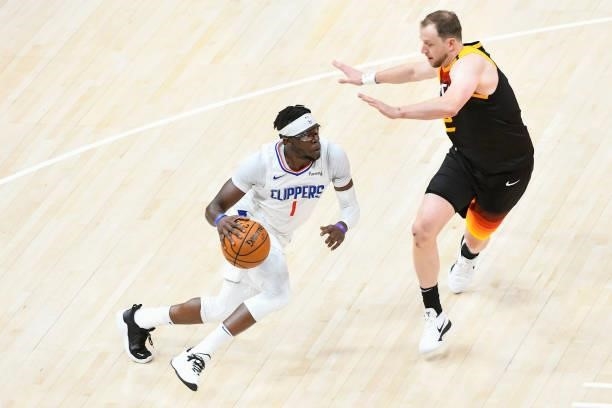 Reggie Jackson of the Los Angeles Clippers drives against Joe Ingles of the Utah Jazz in Game Five of the Western Conference second-round playoff...