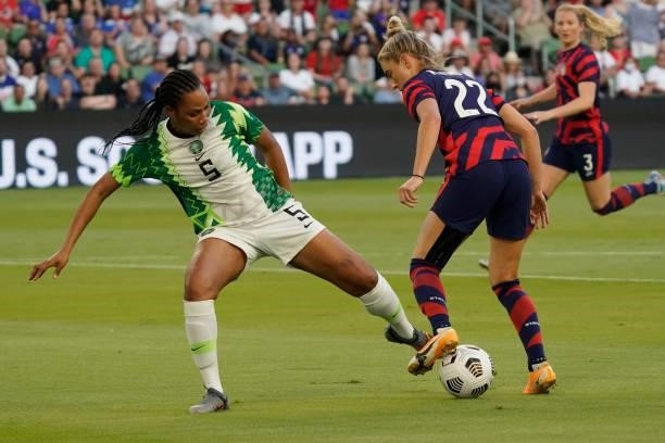 Onome Ebi of Nigeria tries to steal the ball from Kristie Mewis of the United States during the first half of their WNT Summer Series game at Q2...