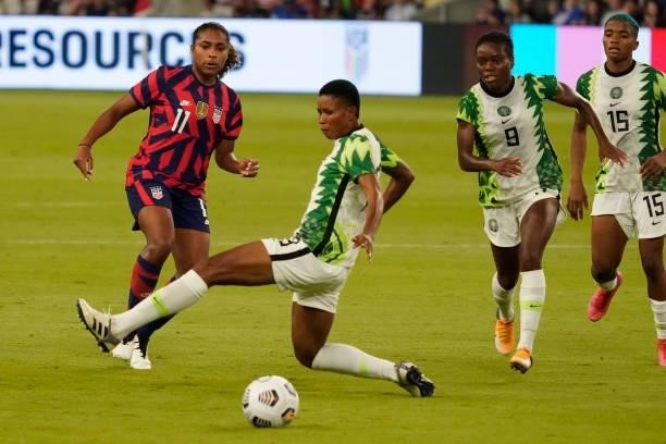 Catarina Macario of the United States shoots against Akudo Ogbonna of Nigeria during the second half of their WNT Summer Series game at Q2 Stadium on...