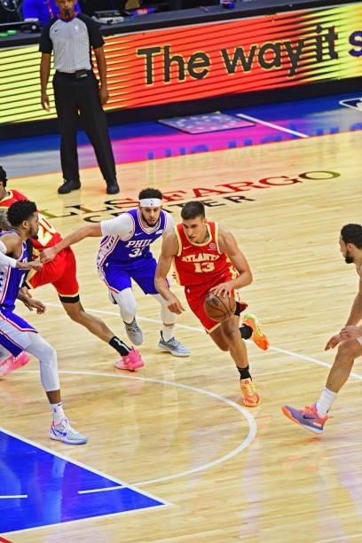 Bogdan Bogdanovic of the Atlanta Hawks drives to the basket against the Philadelphia 76ers in game 5 of the conference semifinals on June 16, 2021 at...