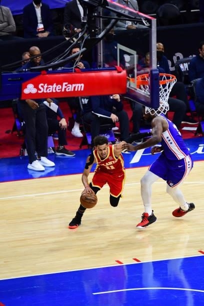 Trae Young of the Atlanta Hawks drives to the basket against the Philadelphia 76ers in game 5 of the conference semifinals on June 16, 2021 at Wells...
