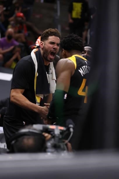Georges Niang of the Utah Jazz and Donovan Mitchell celebrate during Round 2, Game 5 of the 2021 NBA Playoffs on June 16 1, 2021 at vivint.SmartHome...