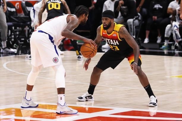 Royce O'Neale of the Utah Jazz plays defense on Paul George of the LA Clippers during Round 2, Game 5 of the 2021 NBA Playoffs on June 16, 2021 at...