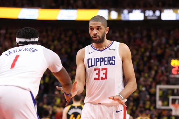 Reggie Jackson and Nicolas Batum of the LA Clippers shake hands during Round 2, Game 5 of the 2021 NBA Playoffs on June 16 1, 2021 at...