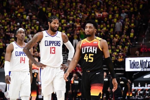 Paul George of the LA Clippers talks to Donovan Mitchell of the Utah Jazz during the game during Round 2, Game 5 of the 2021 NBA Playoffs on June 16,...