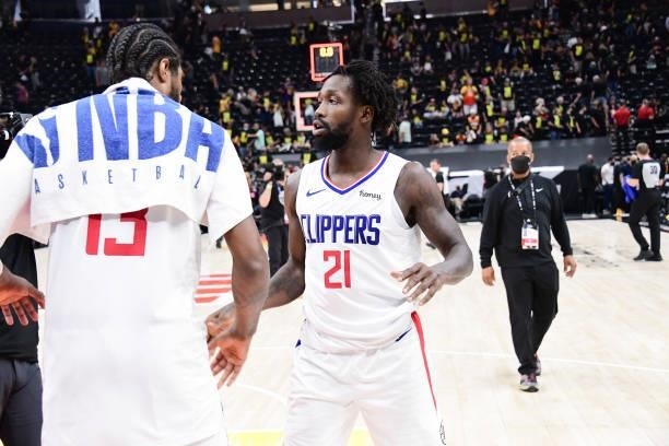 Paul George of the LA Clippers talks to Patrick Beverley of the LA Clippers after the game against the Utah Jazz during Round 2, Game 5 of the 2021...