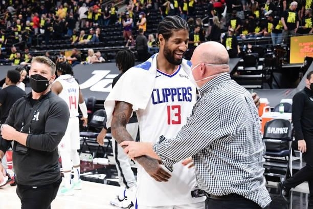 Paul George of the LA Clippers talks to Owner, Steve Ballmer of the LA Clippers after the game against the Utah Jazz during Round 2, Game 5 of the...