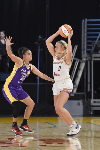 Sophie Cunningham of the Phoenix Mercury handles the ball against Kristi Toliver of the Los Angeles Sparks on June 16, 2021 at Los Angeles Convention...