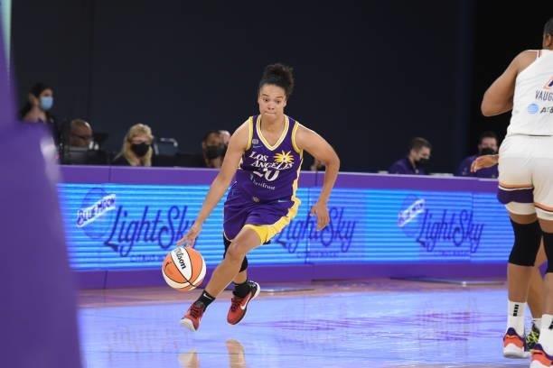 Kristi Toliver of the Los Angeles Sparks dribbles the ball against the Phoenix Mercury on June 16, 2021 at Los Angeles Convention Center in Los...