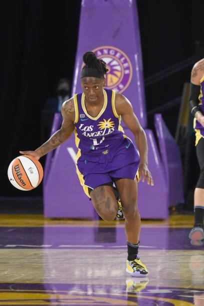 Erica Wheeler of the Los Angeles Sparks dribbles the ball against the Phoenix Mercury on June 16, 2021 at Los Angeles Convention Center in Los...