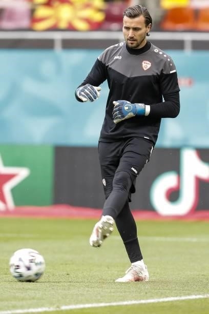 North Macedonia's goalkeeper Stole Dimitrievski warms up prior to the UEFA EURO 2020 Group C football match between Ukraine and North Macedonia at...