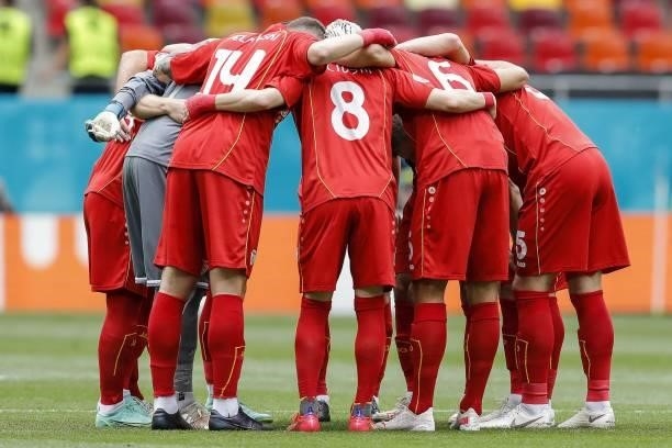 North Macedonia's players huddle before the UEFA EURO 2020 Group C football match between Ukraine and North Macedonia at the National Arena in...