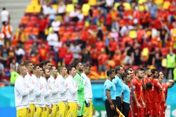 Ukraine's players and North Macedonia's players line up before the UEFA EURO 2020 Group C football match between Ukraine and North Macedonia at the...