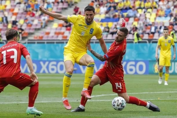 Ukraine's forward Roman Yaremchuk fights for the ball with North Macedonia's defender Darko Velkovski during the UEFA EURO 2020 Group C football...