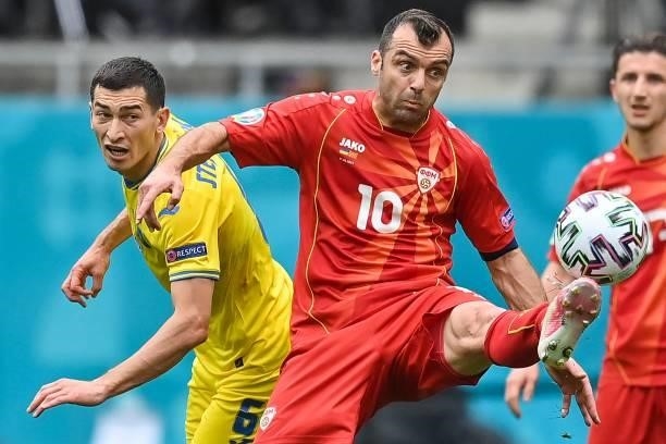 North Macedonia's forward Goran Pandev fights for the ball with Ukraine's midfielder Taras Stepanenko during the UEFA EURO 2020 Group C football...