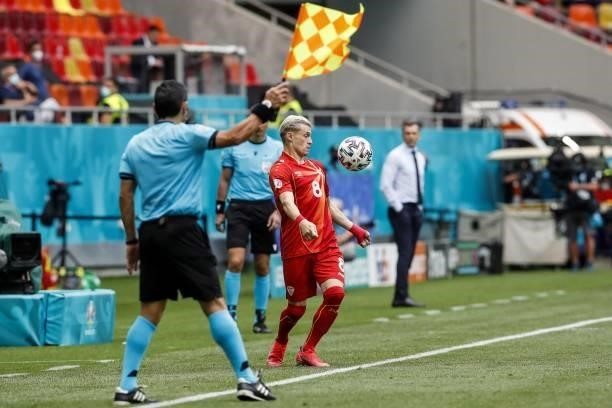 North Macedonia's defender Ezgjan Alioski controls the ball during the UEFA EURO 2020 Group C football match between Ukraine and North Macedonia at...