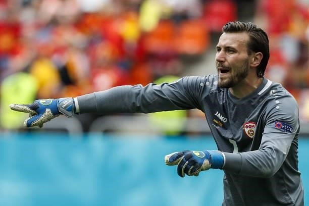 North Macedonia's goalkeeper Stole Dimitrievski gestures during the UEFA EURO 2020 Group C football match between Ukraine and North Macedonia at the...