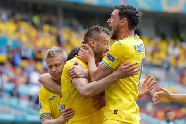 Ukraine's forward Roman Yaremchuk celebrates with Ukraine's forward Andriy Yarmolenko after scoring his team's second goal during the UEFA EURO 2020...