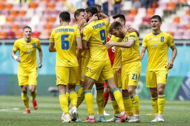 Ukraine's forward Roman Yaremchuk celebrates with Ukraine's forward Andriy Yarmolenko after scoring his team's second goal during the UEFA EURO 2020...