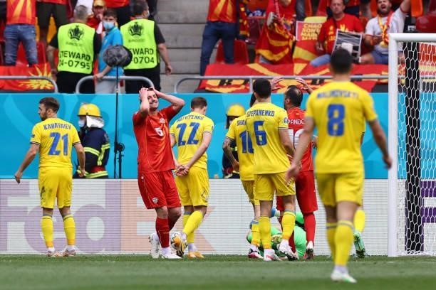 North Macedonia's midfielder Arijan Ademi creacts during the UEFA EURO 2020 Group C football match between Ukraine and North Macedonia at the...