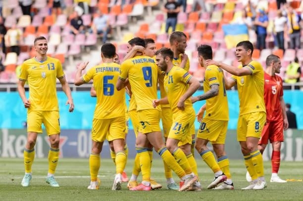 Roman Yaremchuk of Ukraine celebrates after scoring his team's second goal with teammates during the UEFA Euro 2020 Championship Group C match...