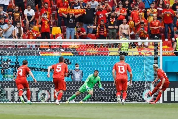 Egzjan Alioski of North Macedonia scores his team's first goal during the UEFA Euro 2020 Championship Group C match between Ukraine and North...