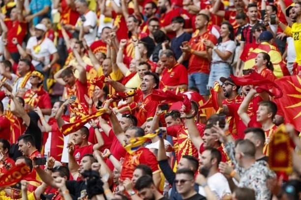 North Macedonia supporters cheer during the UEFA EURO 2020 Group C football match between Ukraine and North Macedonia at the National Arena in...
