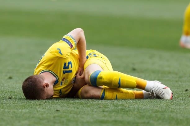Oleksandr Zubkov of Ukraine injured during the UEFA Euro 2020 Championship Group C match between Ukraine and North Macedonia at National Arena on...