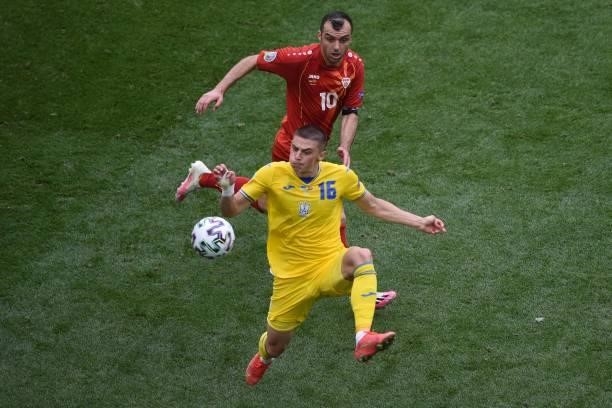 North Macedonia's forward Goran Pandev fights for the ball with Ukraine's defender Vitaliy Mykolenko during the UEFA EURO 2020 Group C football match...