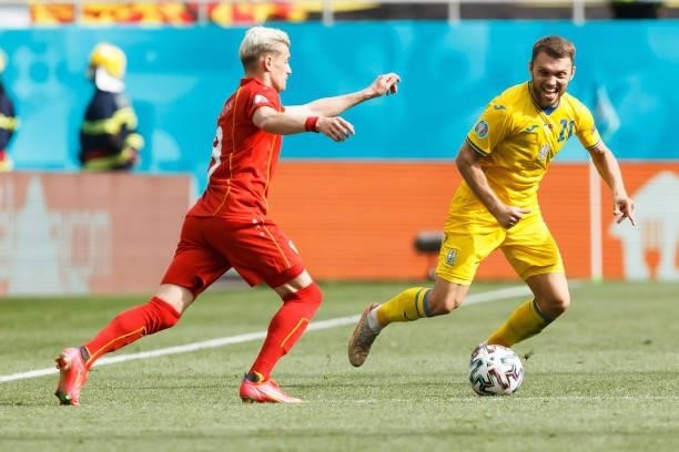 Egzjan Alioski of North Macedonia and Oleksandr Karavaev of Ukraine battle for the ball during the UEFA Euro 2020 Championship Group C match between...
