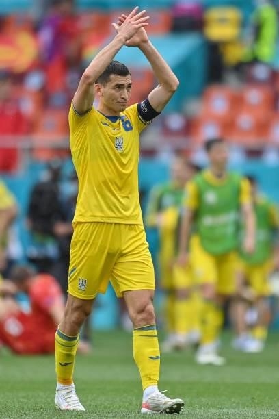 Ukraine's midfielder Taras Stepanenko reacts after winning the UEFA EURO 2020 Group C football match between Ukraine and North Macedonia at the...