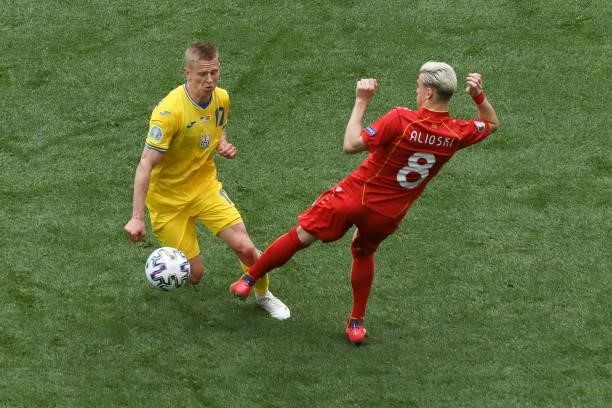 Oleksandr Zinchenko and Ezgjan Alioski during the UEFA Euro 2020 Championship Group C match between Ukraine and North Macedonia at National Arena on...