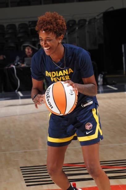Danielle Robinson of the Indiana Fever warms up prior to the game against the Seattle Storm on June 17, 2021 at Indiana Farmers Coliseum Fieldhouse...