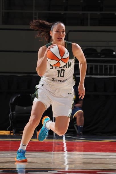 Sue Bird of the Seattle Storm dribbles the ball during the game against the Indiana Fever on June 17, 2021 at Indiana Farmers Coliseum Fieldhouse in...