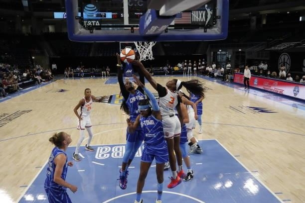 Kahleah Copper of the Chicago Sky and Kaila Charles of the Connecticut Sun fight for the rebound during the game on June 17, 2021 at the Wintrust...
