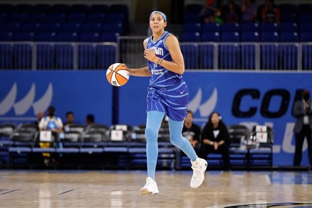 Candace Parker of the Chicago Sky handles the ball during the game against the Connecticut Sun on June 17, 2021 at the Wintrust Arena in Chicago,...