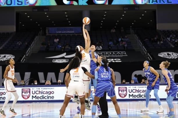 Brionna Jones of the Connecticut Sun and Stefanie Dolson of the Chicago Sky tip off during the game on June 17, 2021 at the Wintrust Arena in...