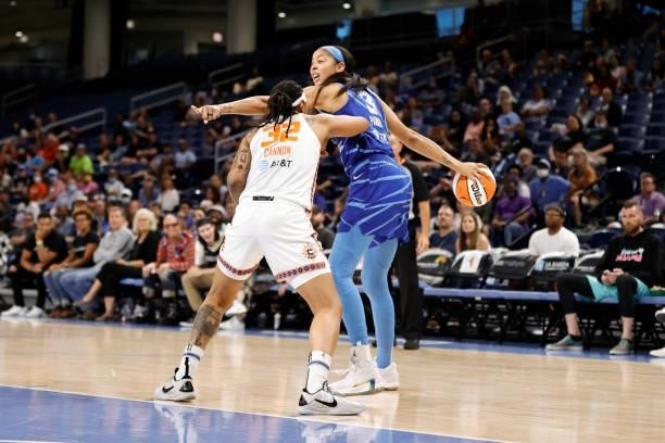 Candace Parker of the Chicago Sky handles the ball during the game against the Connecticut Sun on June 17, 2021 at the Wintrust Arena in Chicago,...