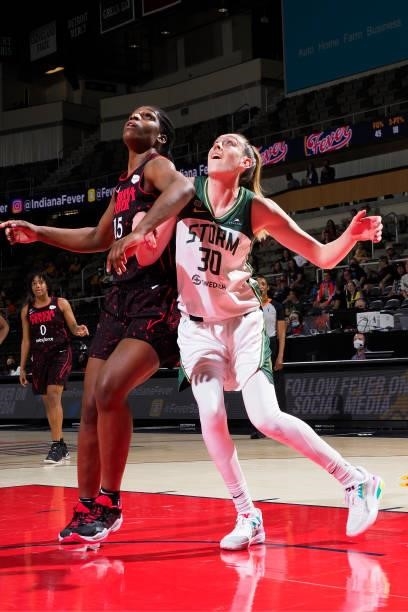 Breanna Stewart of the Seattle Storm plays defense on Teaira McCowan of the Indiana Fever during the game on June 17, 2021 at Indiana Farmers...