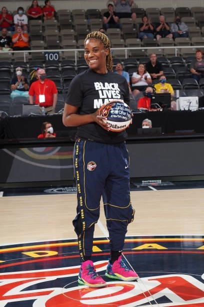 Jantel Lavender of the Indiana Fever is recognized for reaching 2,500 career points prior to the game against the Seattle Storm on June 17, 2021 at...